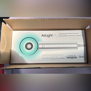 L'Oreal AirLight Pro Hair Dryer in Silver and White